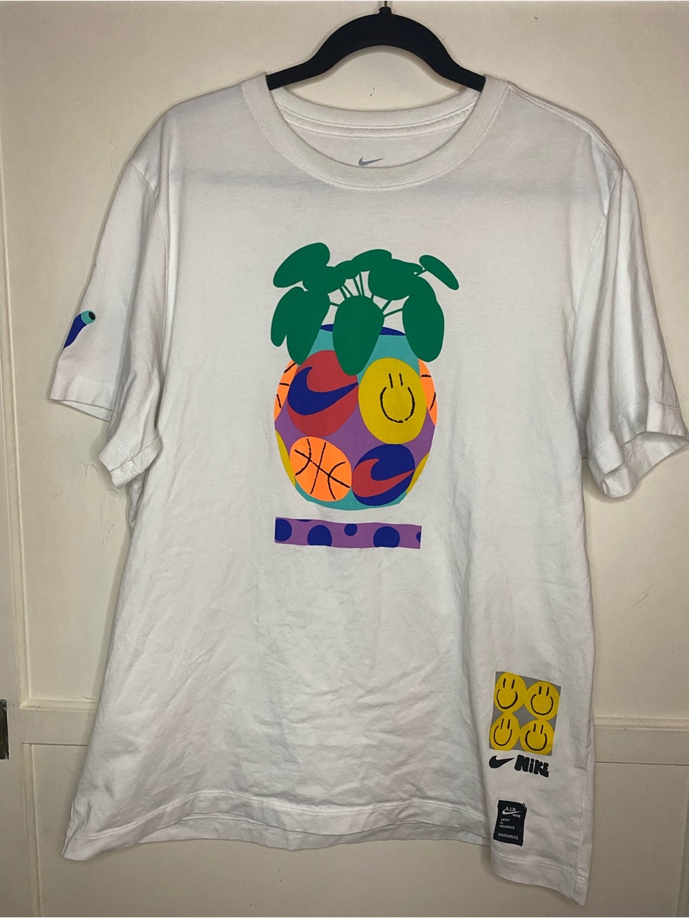 Nike White Graphic Tee with Colorful Print